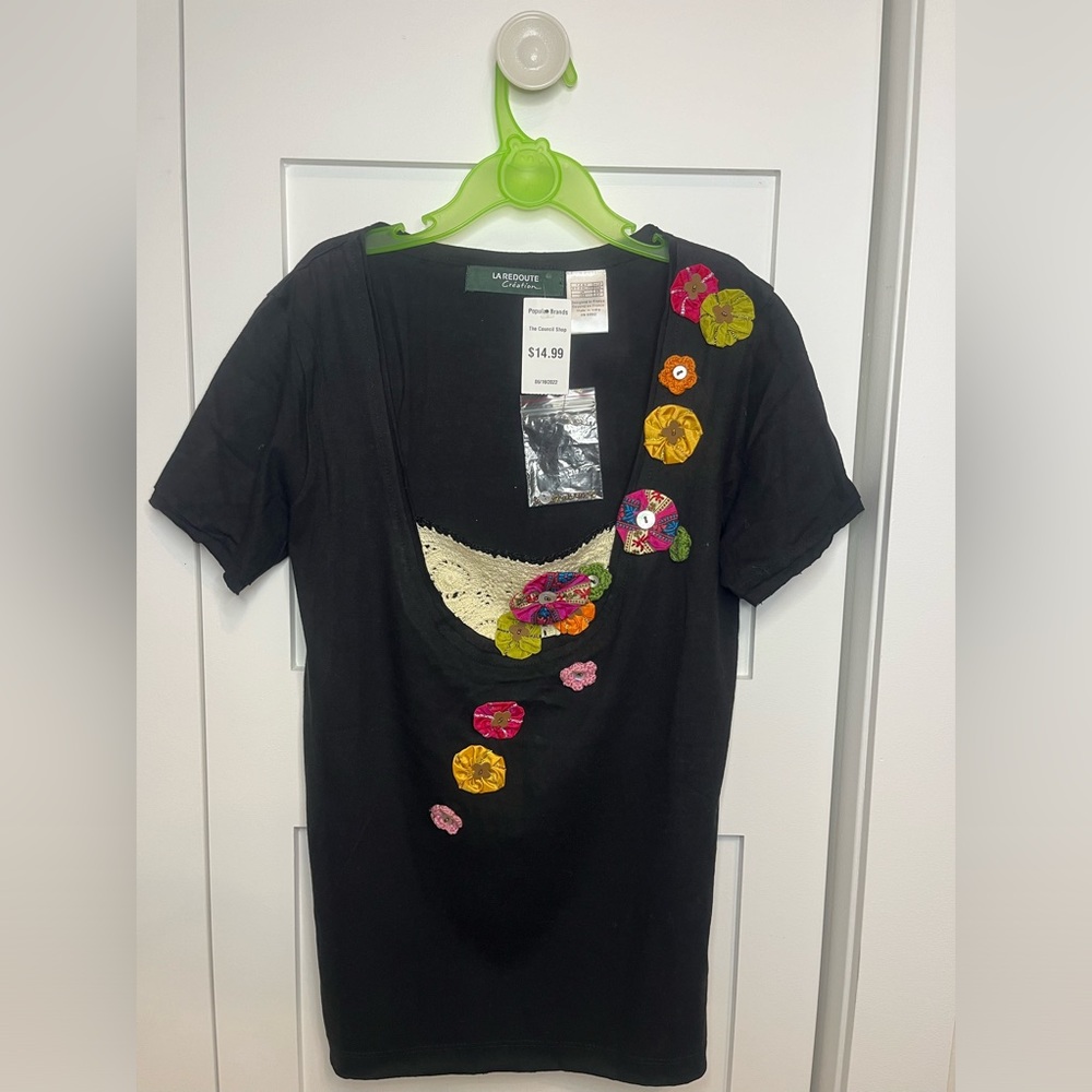 Hi, selling this cute shirt for women in size US 2/4 (XS-S)